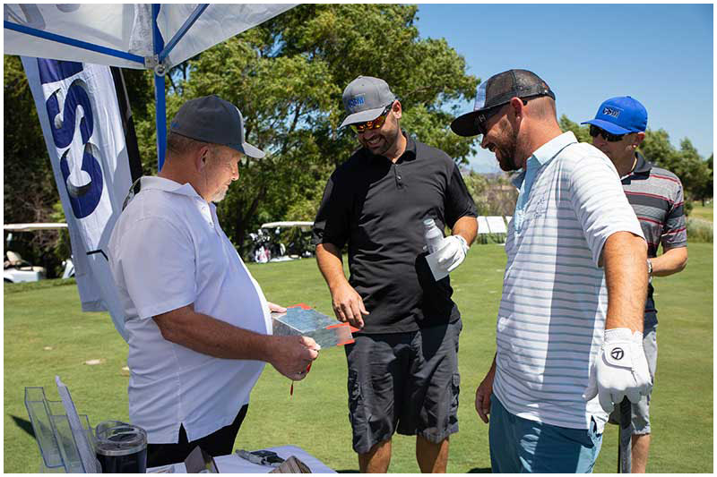Professionals checking out Quality Metal samples